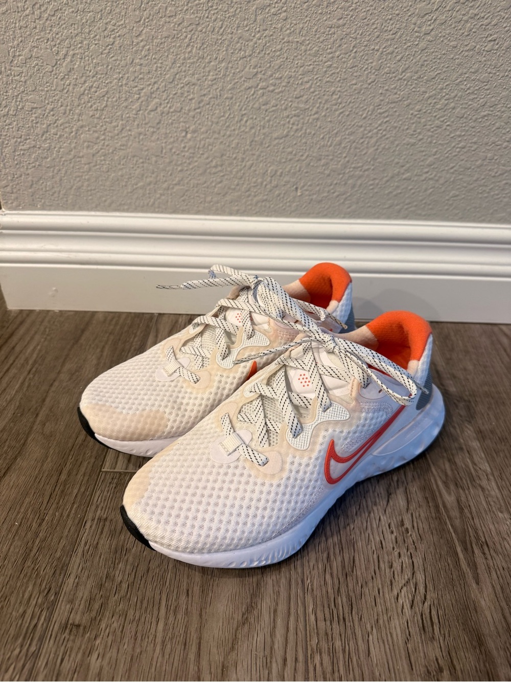 Women’s Nike White Sneakers with Orange Accents